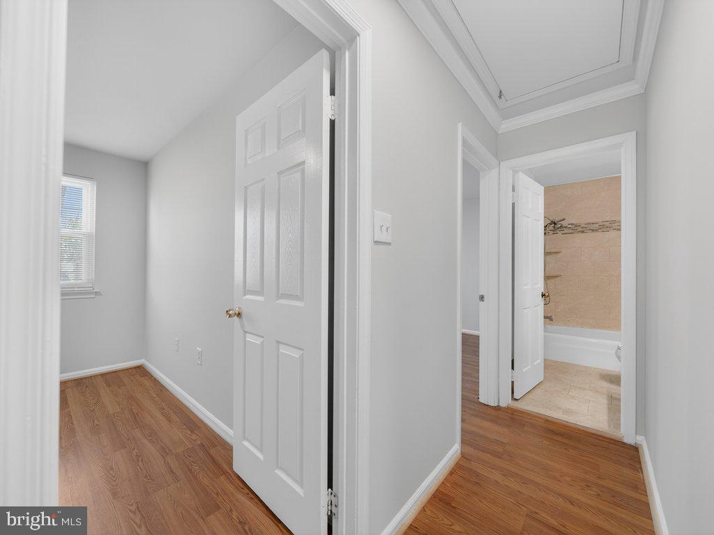 3827 Gawayne Terrace Silver Spring, MD 20906 - Photo 27 of 45 a view of a hallway with wooden floor