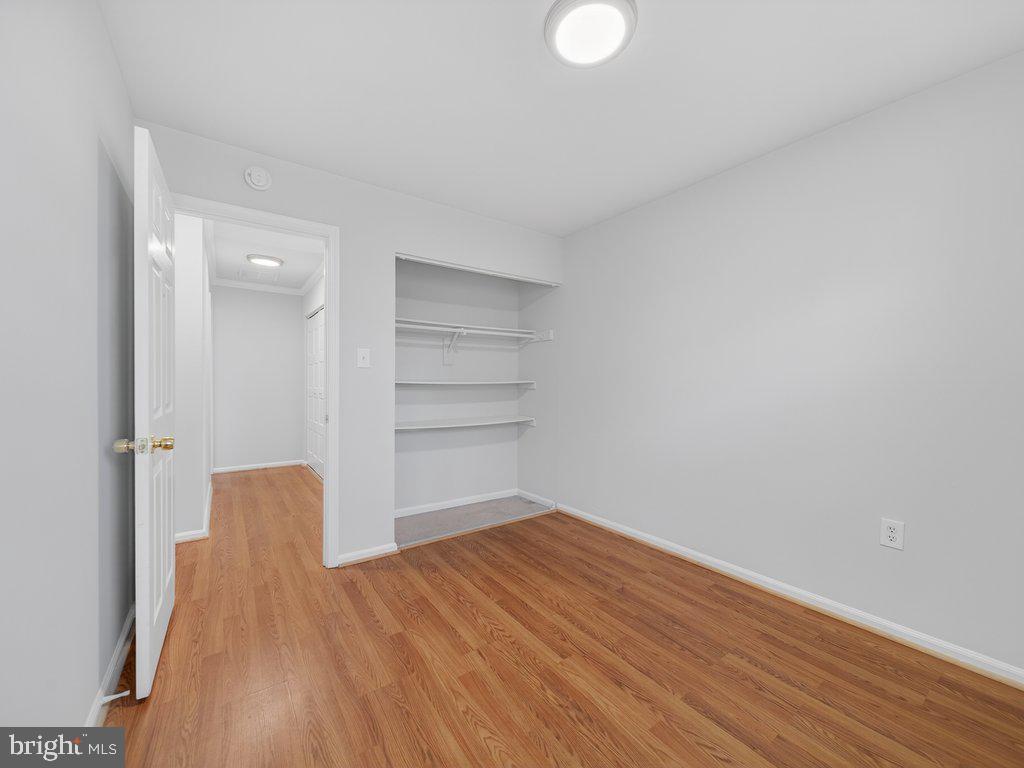 3827 Gawayne Terrace Silver Spring, MD 20906 - Photo 30 of 45 a view of empty room with wooden floor