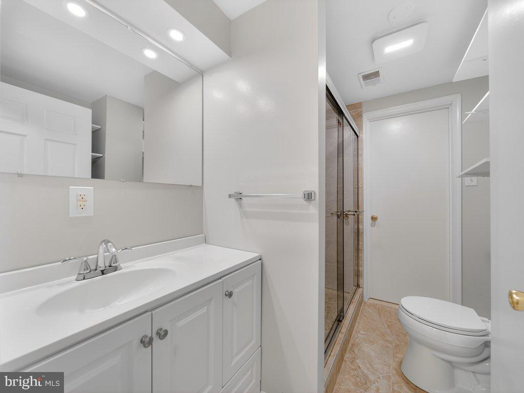3827 Gawayne Terrace Silver Spring, MD 20906 - Photo 36 of 45 a bathroom with a sink toilet and shower