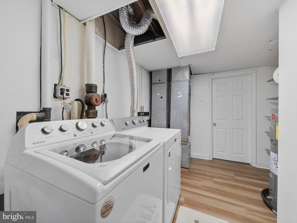 3827 Gawayne Terrace Silver Spring, MD 20906 - Photo 40 of 45 a utility room with dryer and washer