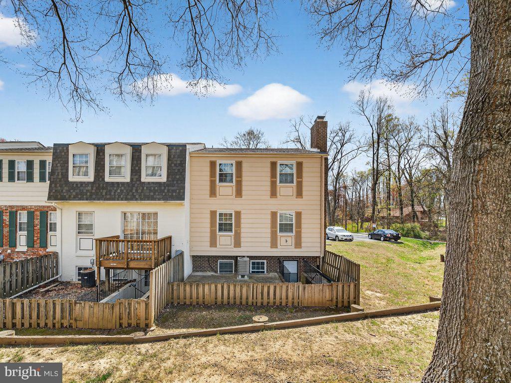 3827 Gawayne Terrace Silver Spring, MD 20906 - Photo 45 of 45 a view of a porch with furniture and a fire pit