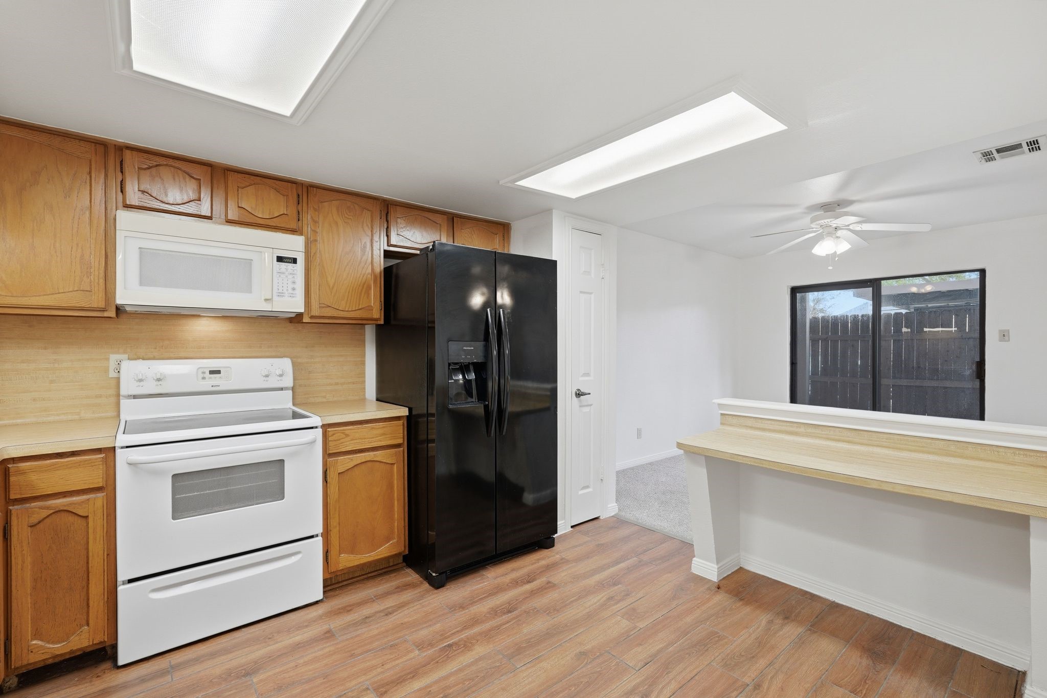 16949 Castleton Farms Road, Unit 44 Spring, TX 77379 - Photo 11 of 30 The cabinets are in great shape! There is a built in office nook, could be a breakfast bar or replaced with an island!