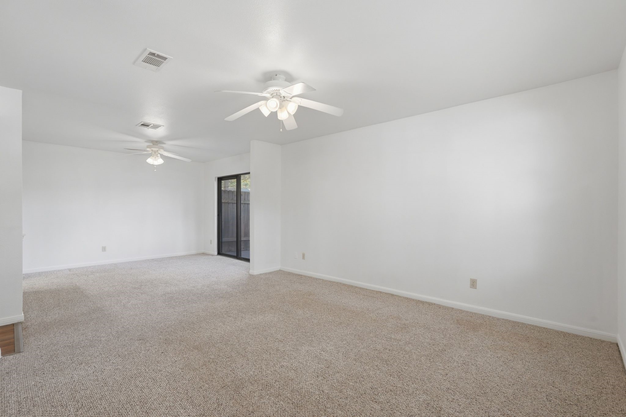 16949 Castleton Farms Road, Unit 44 Spring, TX 77379 - Photo 6 of 30 Two ceiling fans, and sliding glass door to your patio!