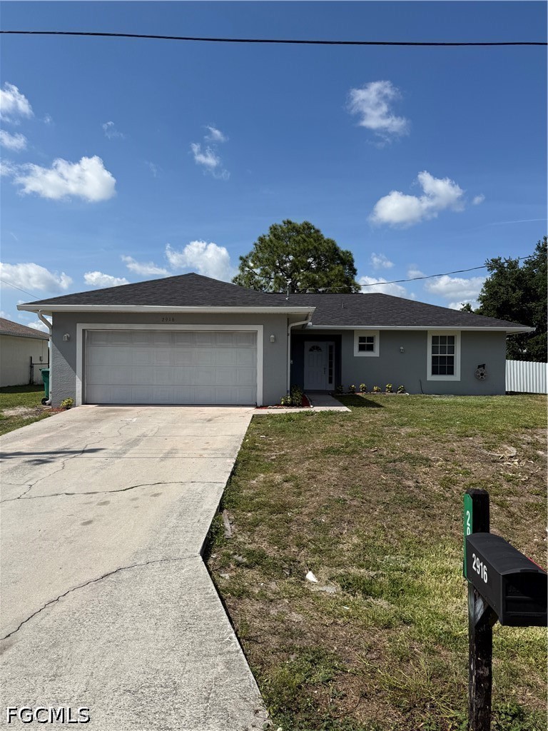 front view of a house with a yard