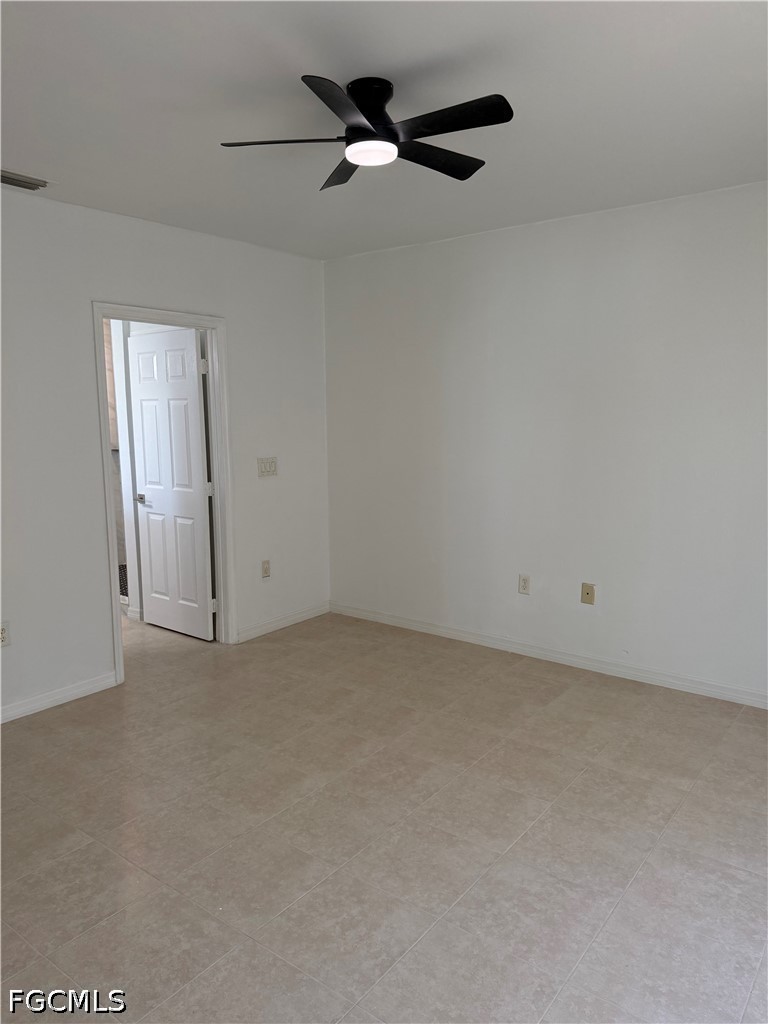 2916 7th Street Southwest Lehigh Acres, FL 33976 - Photo 11 of 19 a view of an empty room