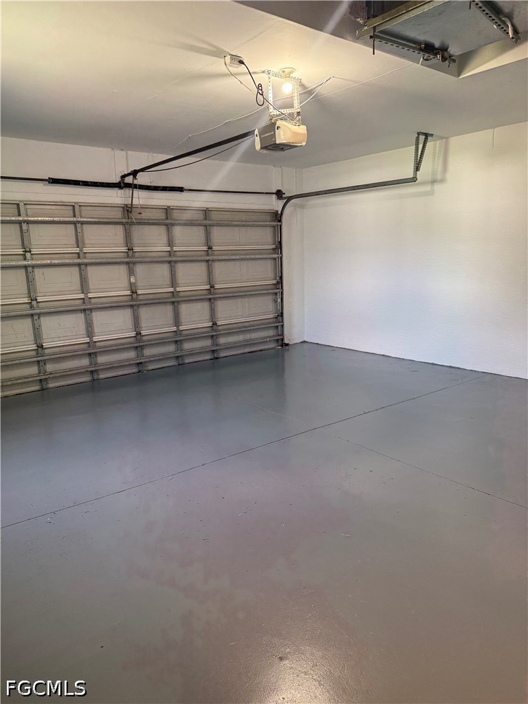 2916 7th Street Southwest Lehigh Acres, FL 33976 - Photo 16 of 19 a view of a garage