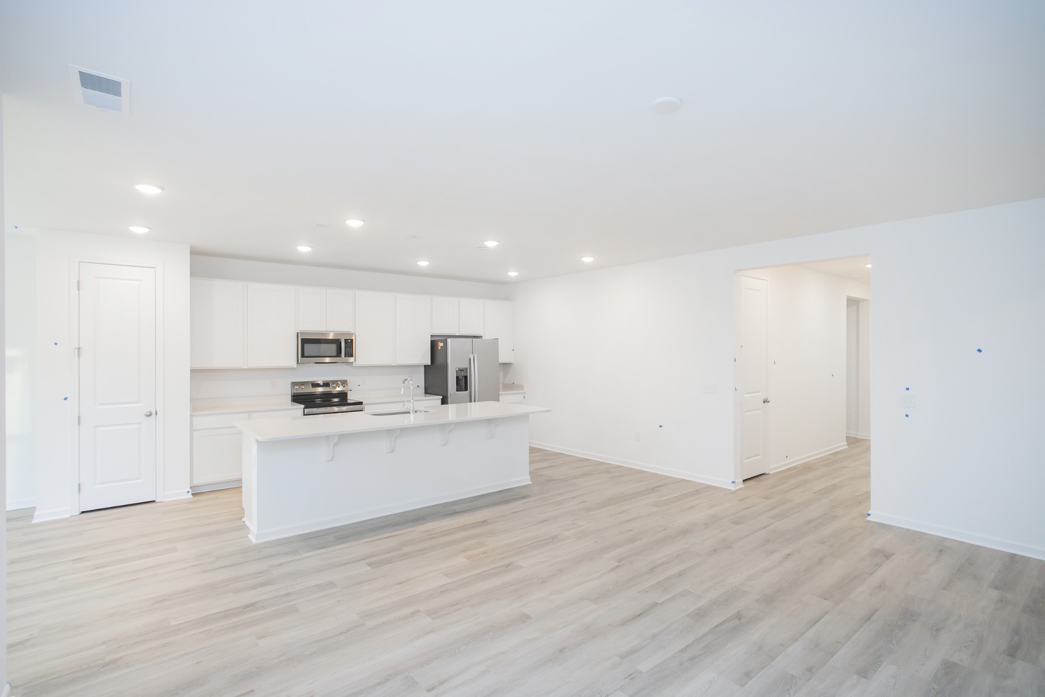 306 Hickory Pointe Drive Dickson, TN 37055 - Photo 20 of 36 a view of kitchen with sink wooden floor and living room