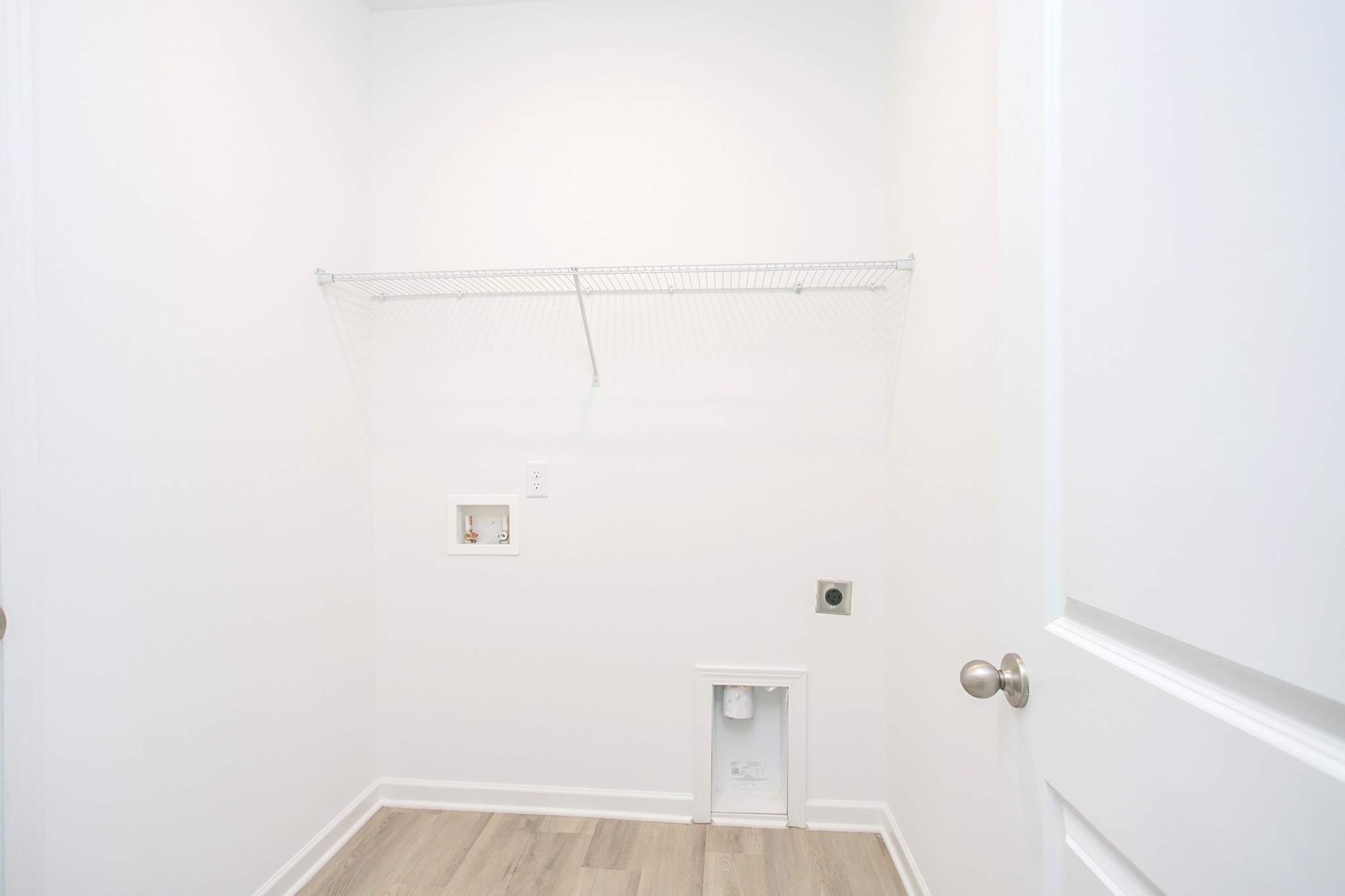 306 Hickory Pointe Drive Dickson, TN 37055 - Photo 28 of 36 a view of a room with racks on the wall