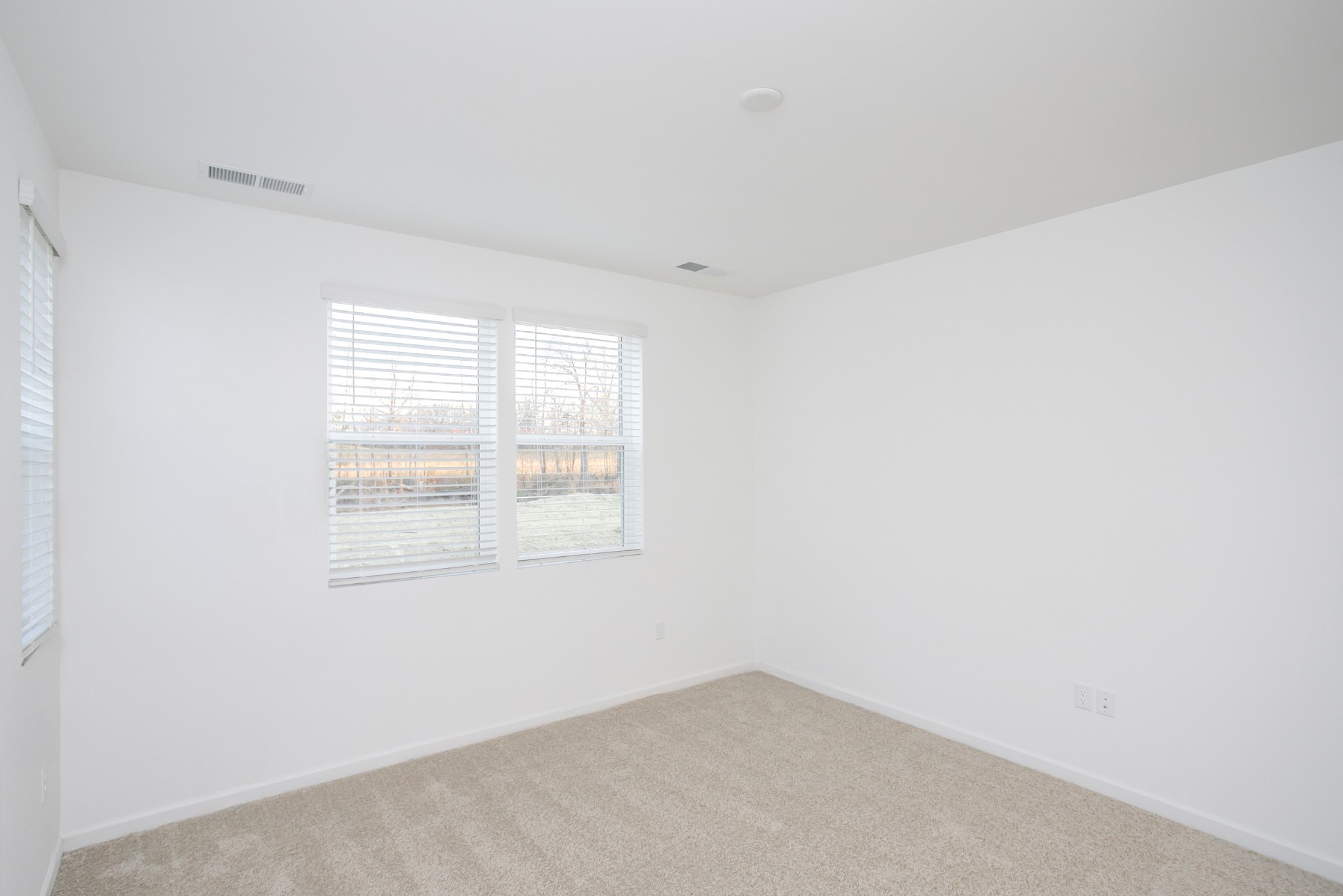 306 Hickory Pointe Drive Dickson, TN 37055 - Photo 32 of 36 an empty room with a window