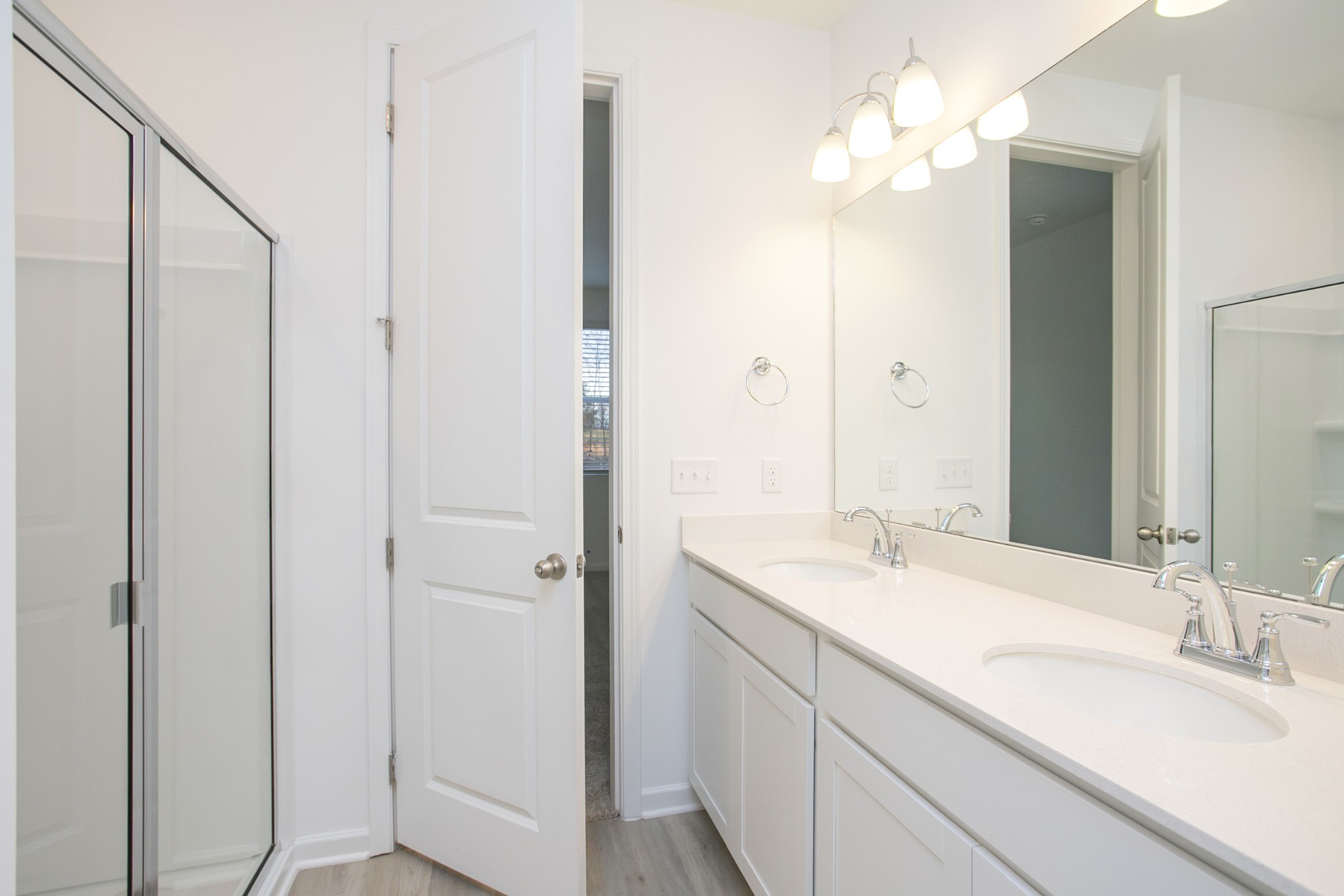 306 Hickory Pointe Drive Dickson, TN 37055 - Photo 34 of 36 a bathroom with a sink vanity and a mirror