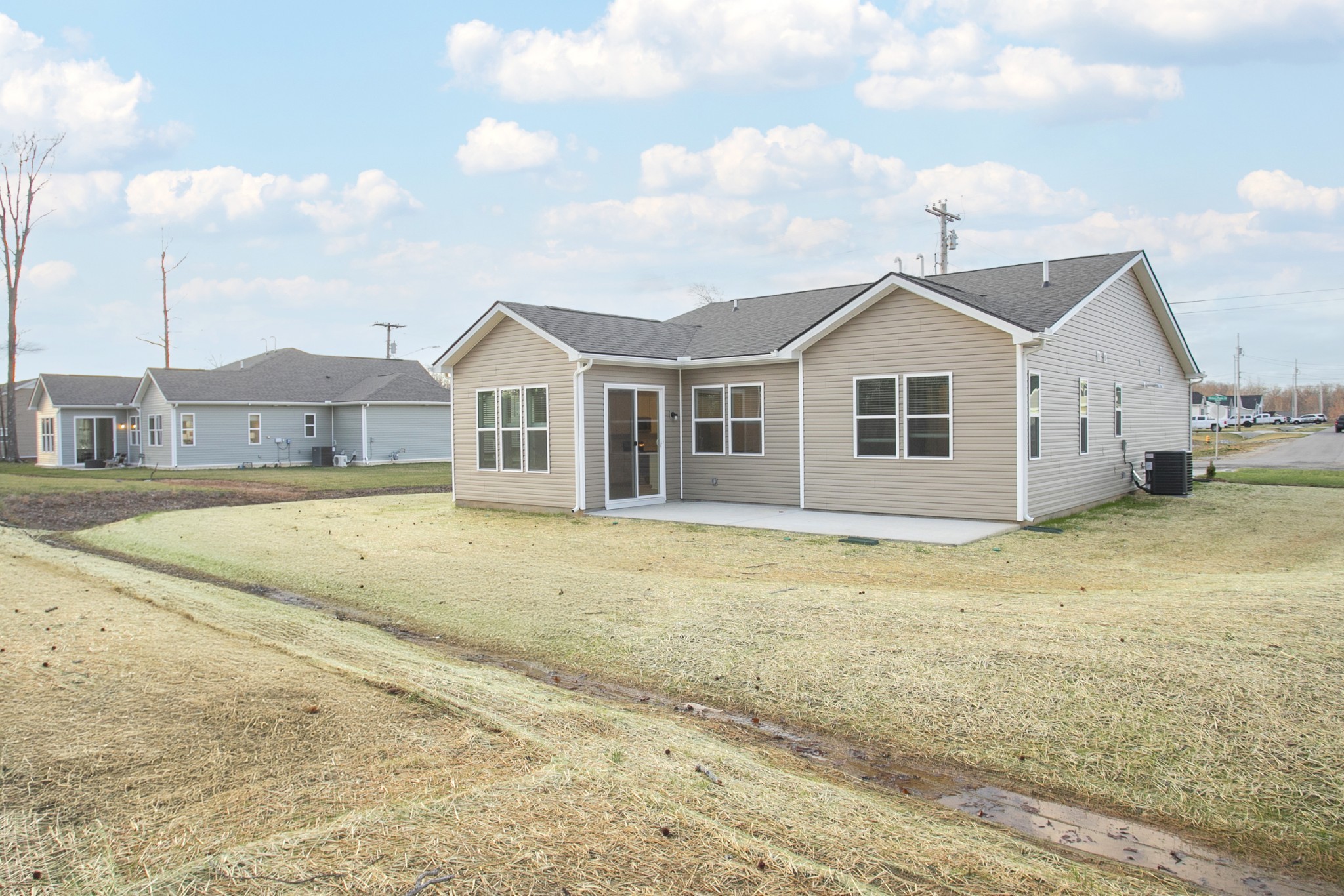 306 Hickory Pointe Drive Dickson, TN 37055 - Photo 8 of 36 a view of a large house with a big yard and large trees