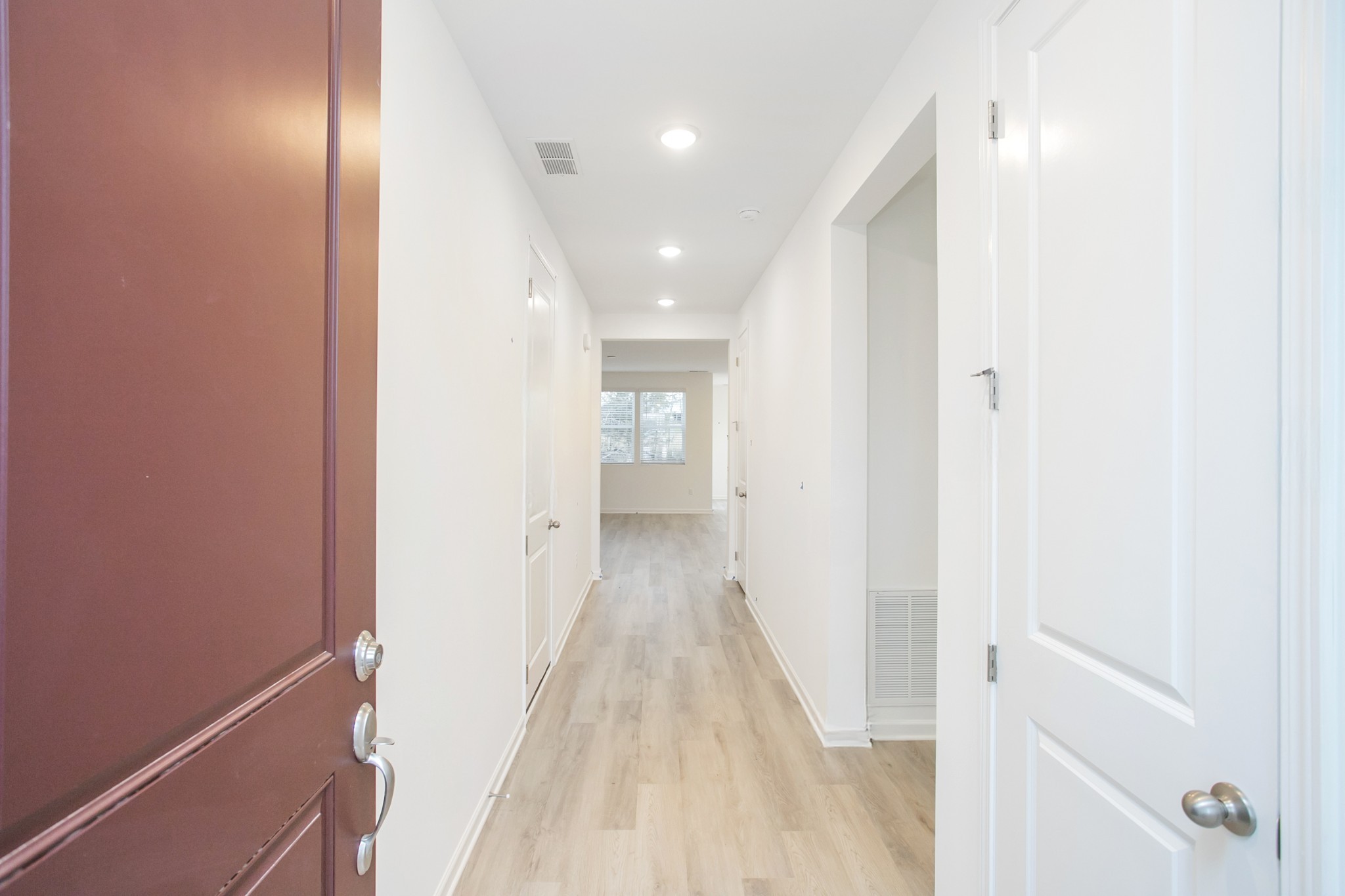 306 Hickory Pointe Drive Dickson, TN 37055 - Photo 9 of 36 a view of a hallway with wooden floor