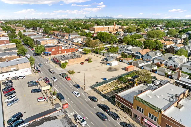 an aerial view of a city with lots of residential buildings