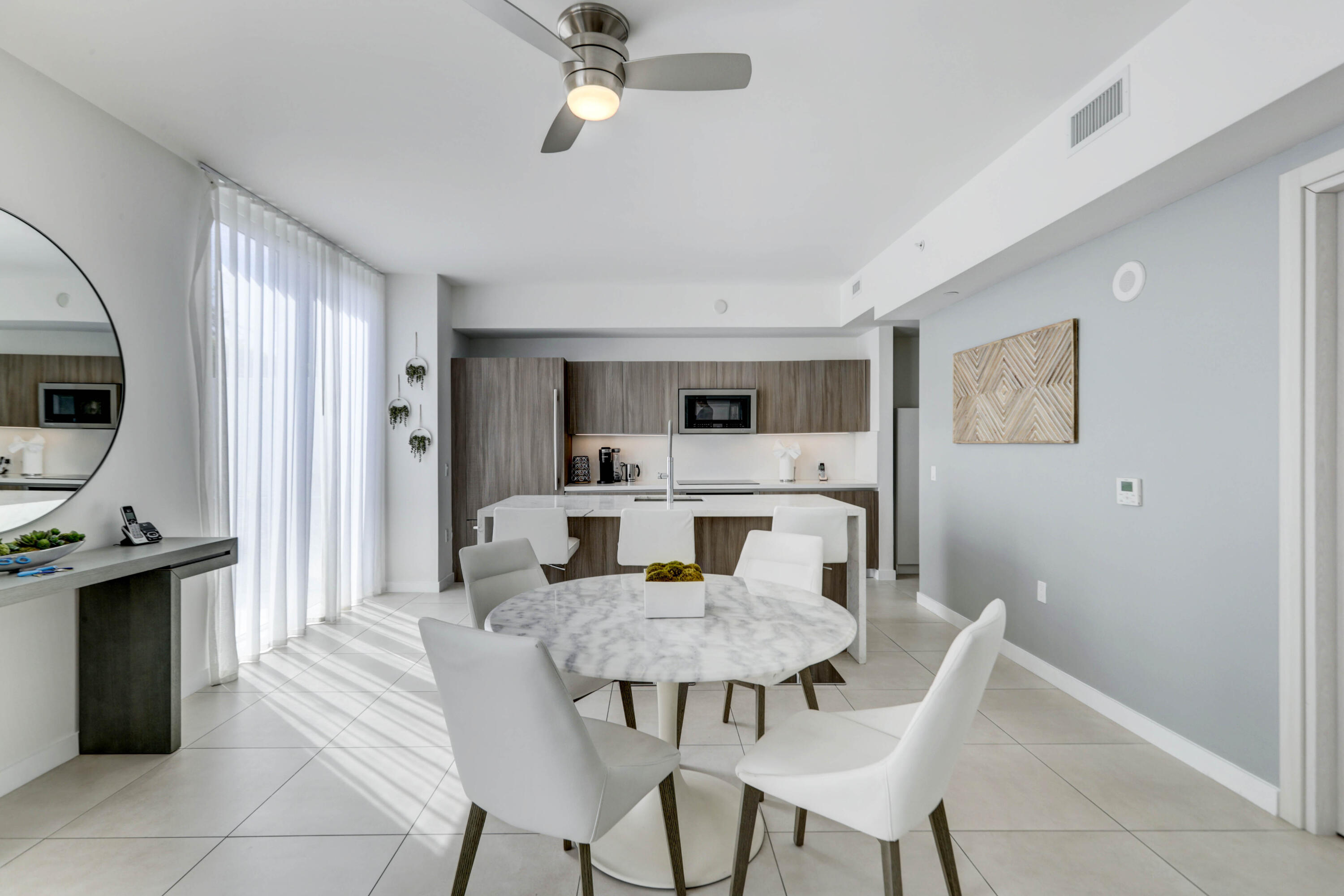 401 North Birch Road, Unit TH3 Fort Lauderdale, FL 33304 - Photo 11 of 49 a view of a dining room with furniture