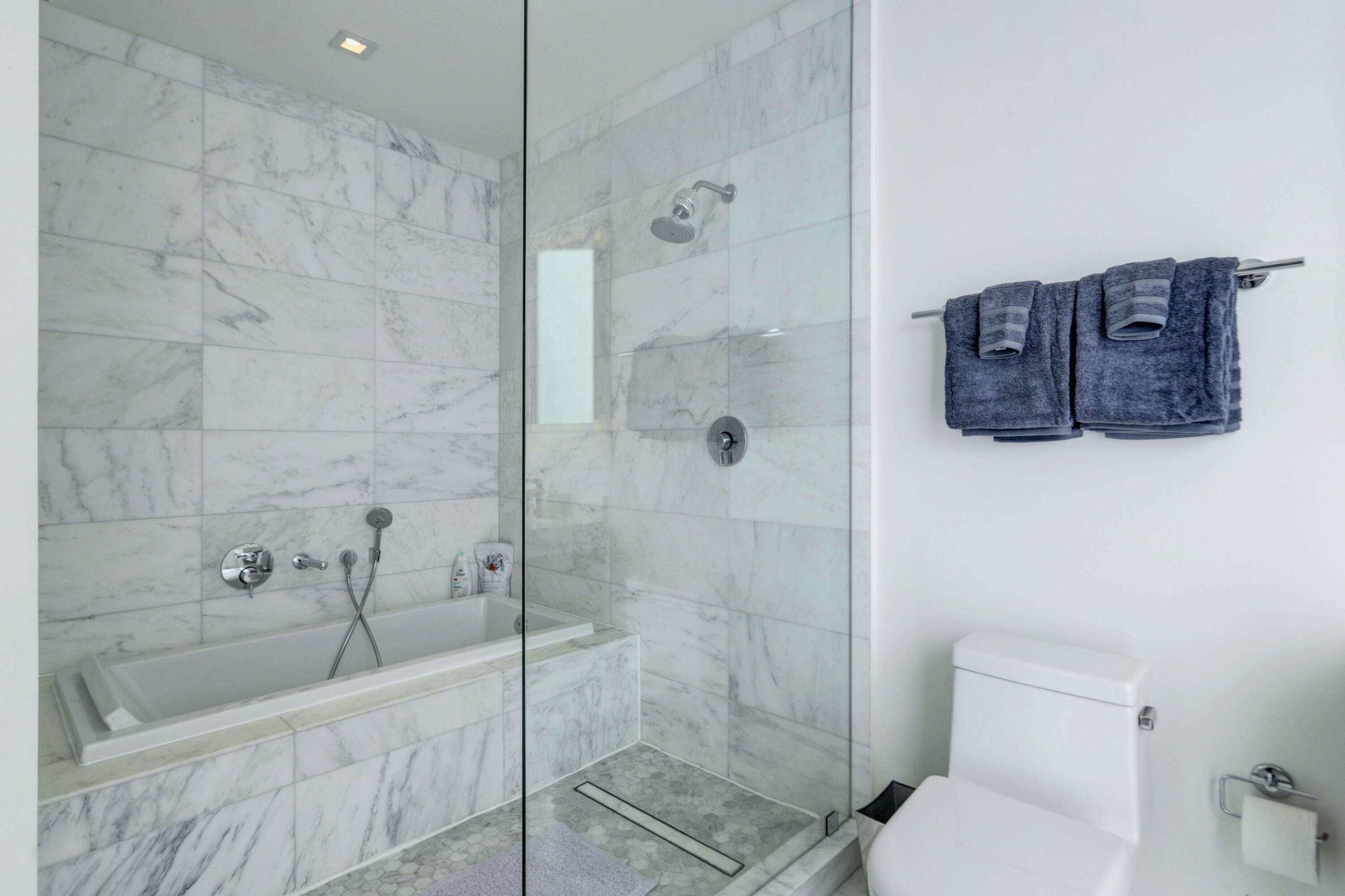 401 North Birch Road, Unit TH3 Fort Lauderdale, FL 33304 - Photo 24 of 49 a bathroom with a toilet and shower