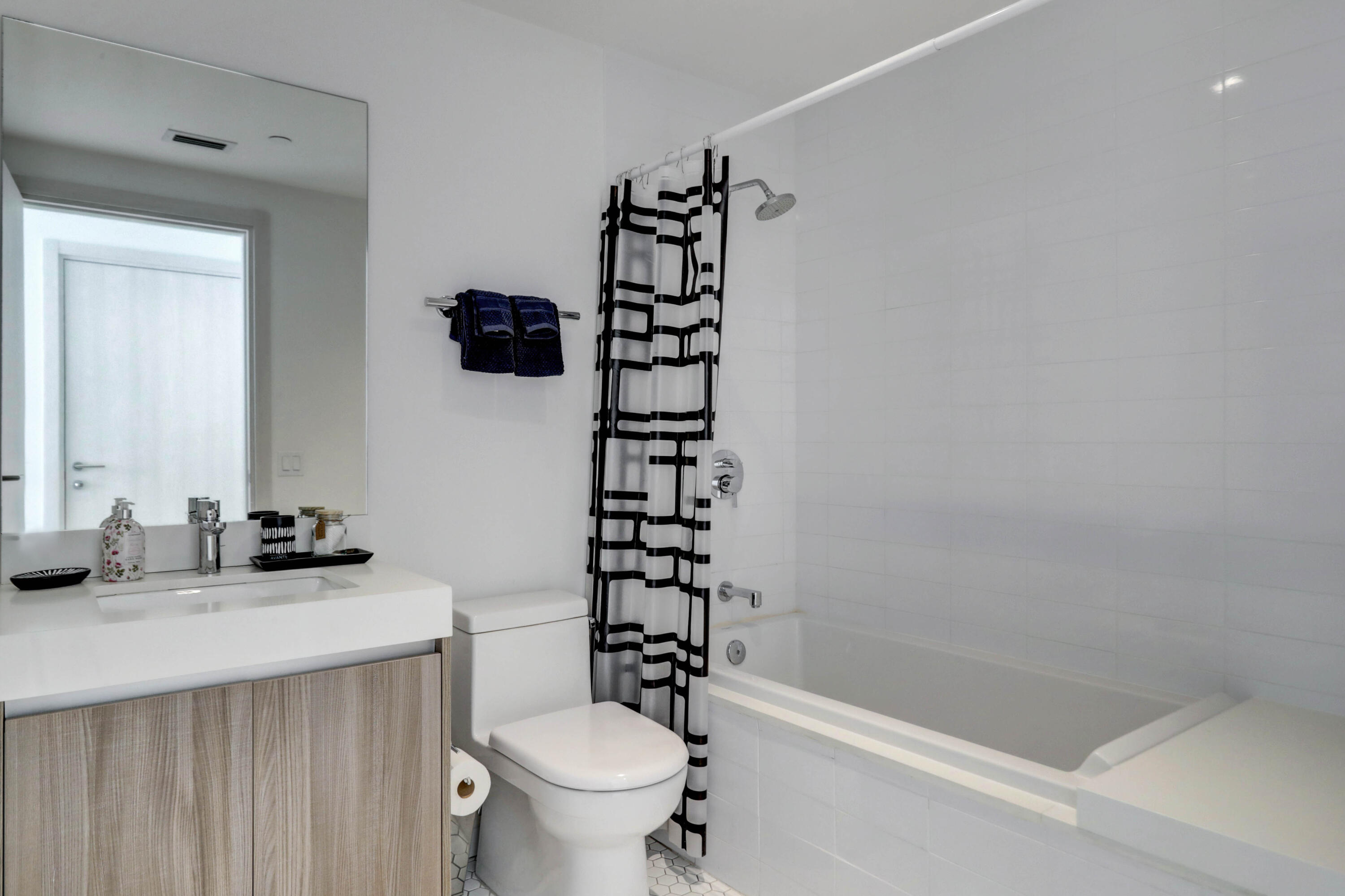 401 North Birch Road, Unit TH3 Fort Lauderdale, FL 33304 - Photo 26 of 49 a bathroom with a sink a toilet and shower