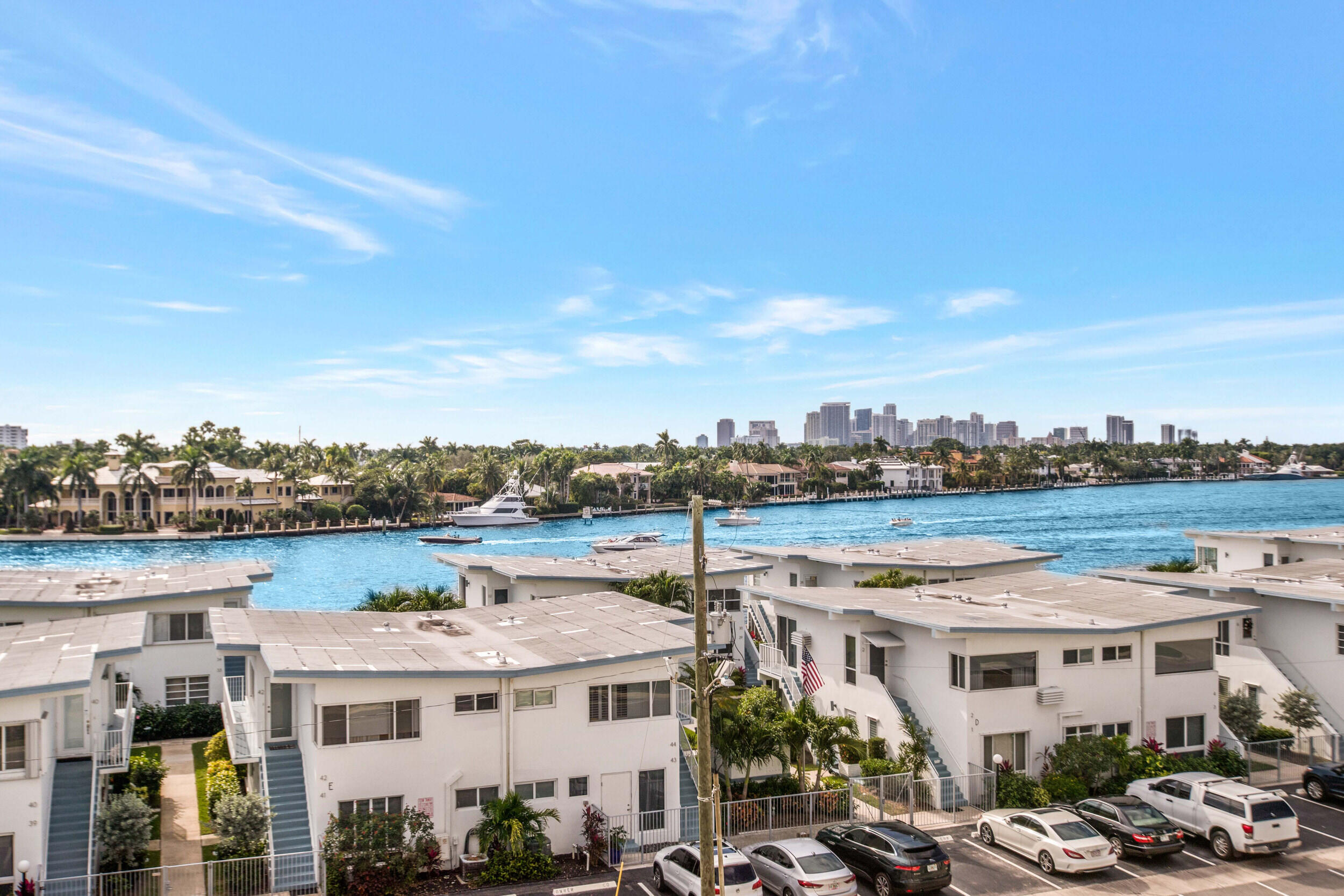 401 North Birch Road, Unit TH3 Fort Lauderdale, FL 33304 - Photo 38 of 49 a view of a lake with building in front of it