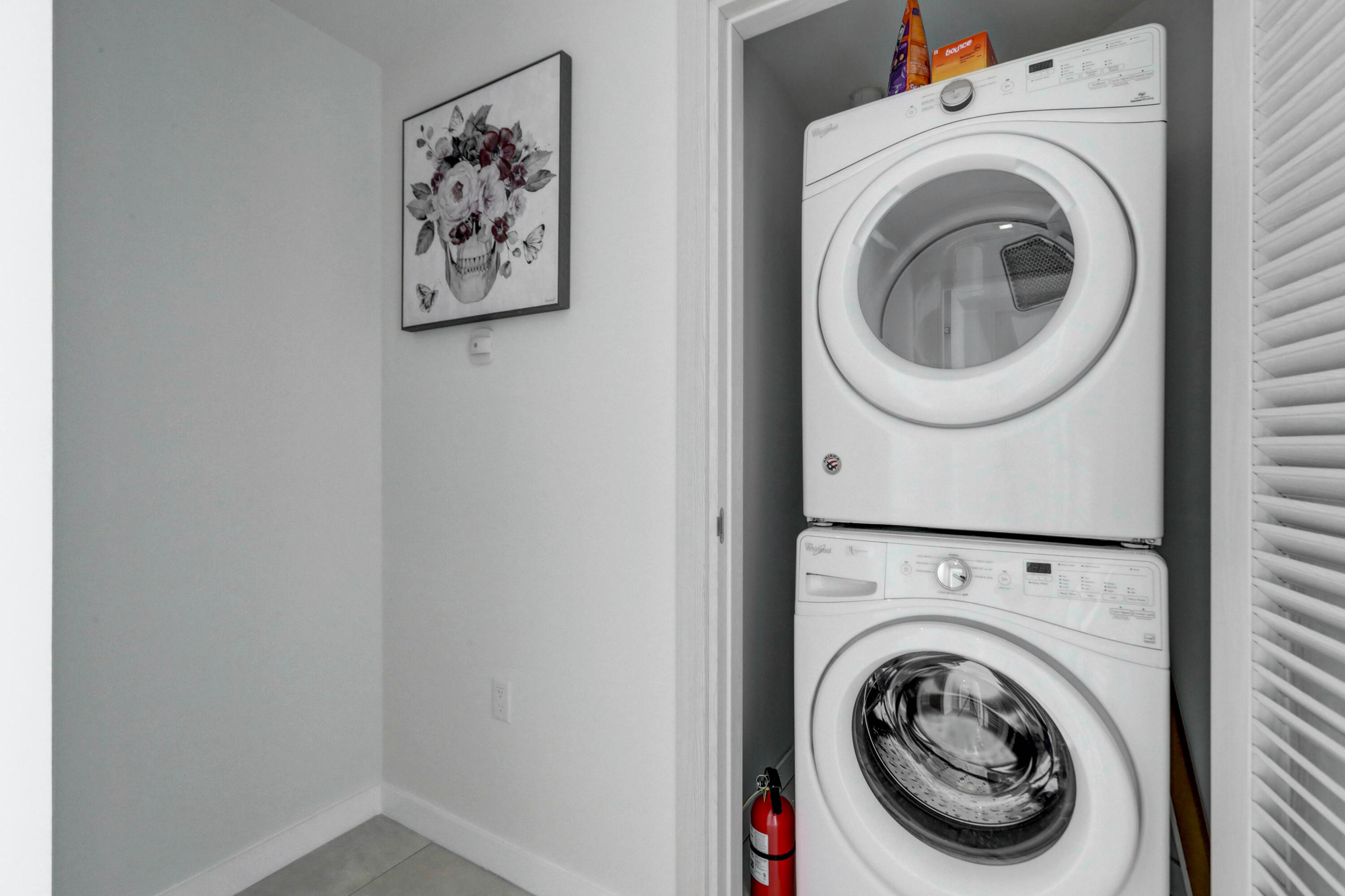 401 North Birch Road, Unit TH3 Fort Lauderdale, FL 33304 - Photo 48 of 49 a utility room with dryer and washer
