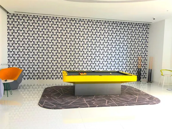 a living room with a couch and a table