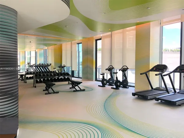 a view of a room with gym equipment