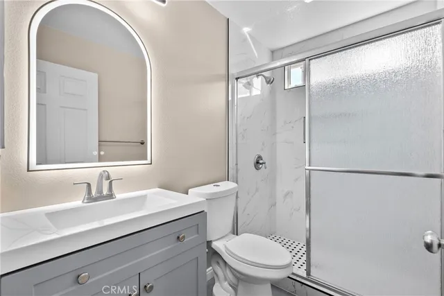 a view of a street with brick building in front of it