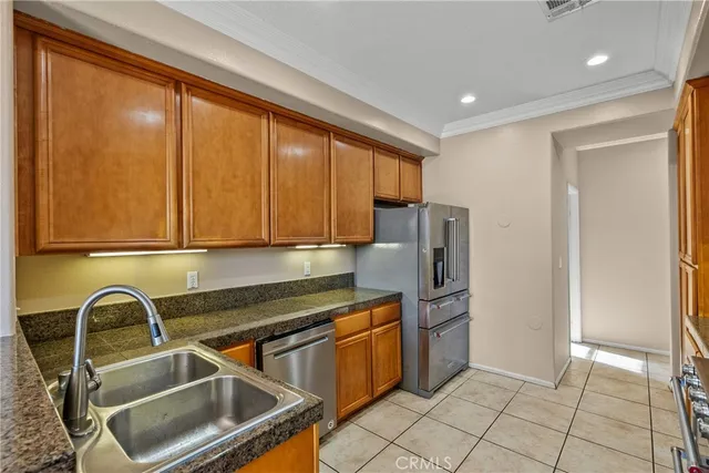 a kitchen with a stove and a microwave