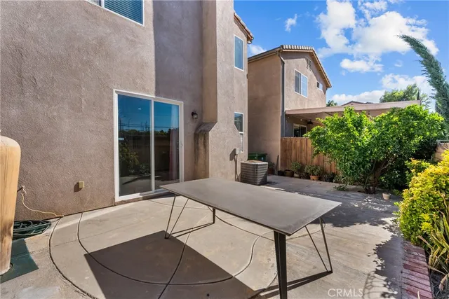 a view of parking garage with cars