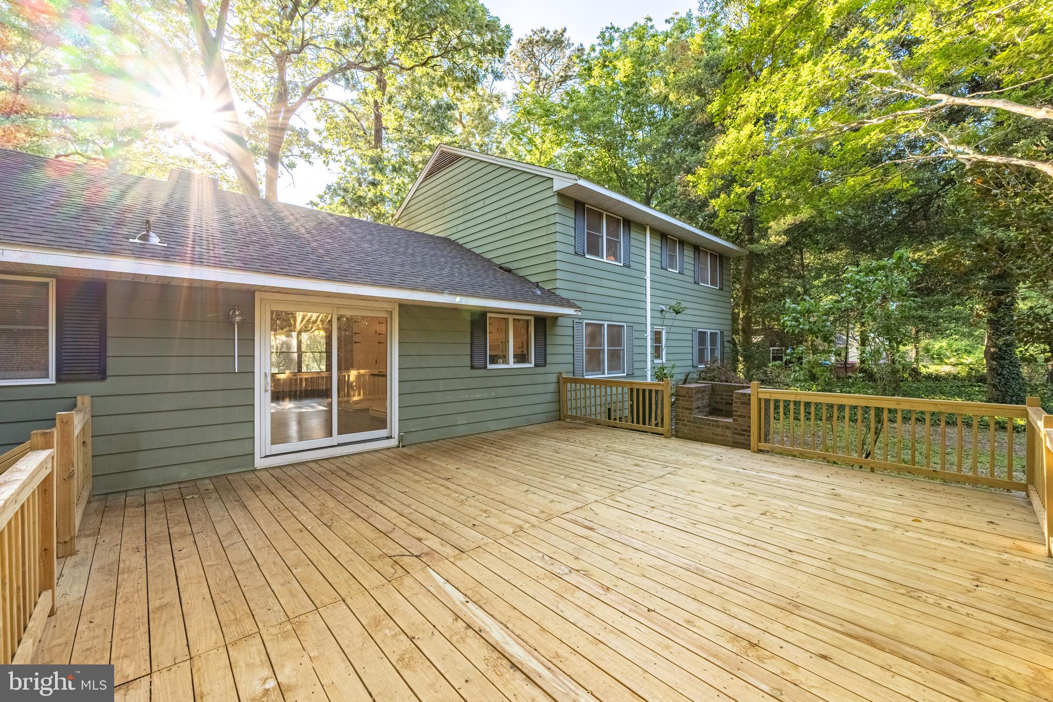 6181 Rockawalkin Road Salisbury, MD 21801 - Photo 57 of 65 a view of house with deck and wooden floor