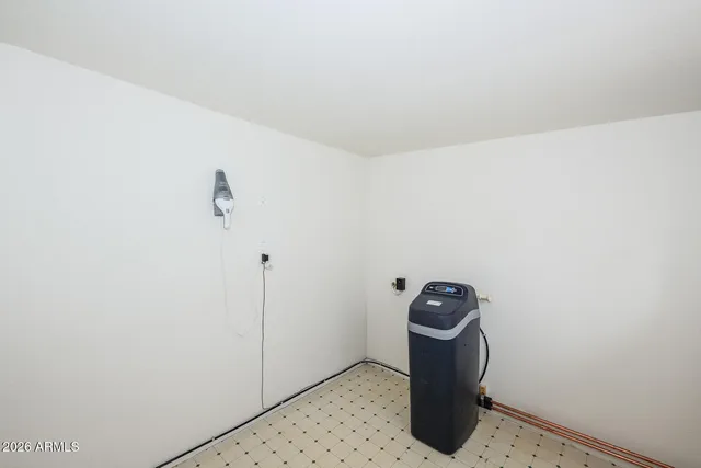 a bathroom with a toilet sink and shower