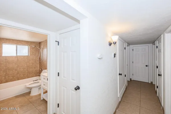 a bathroom with a sink a toilet and a bathtub