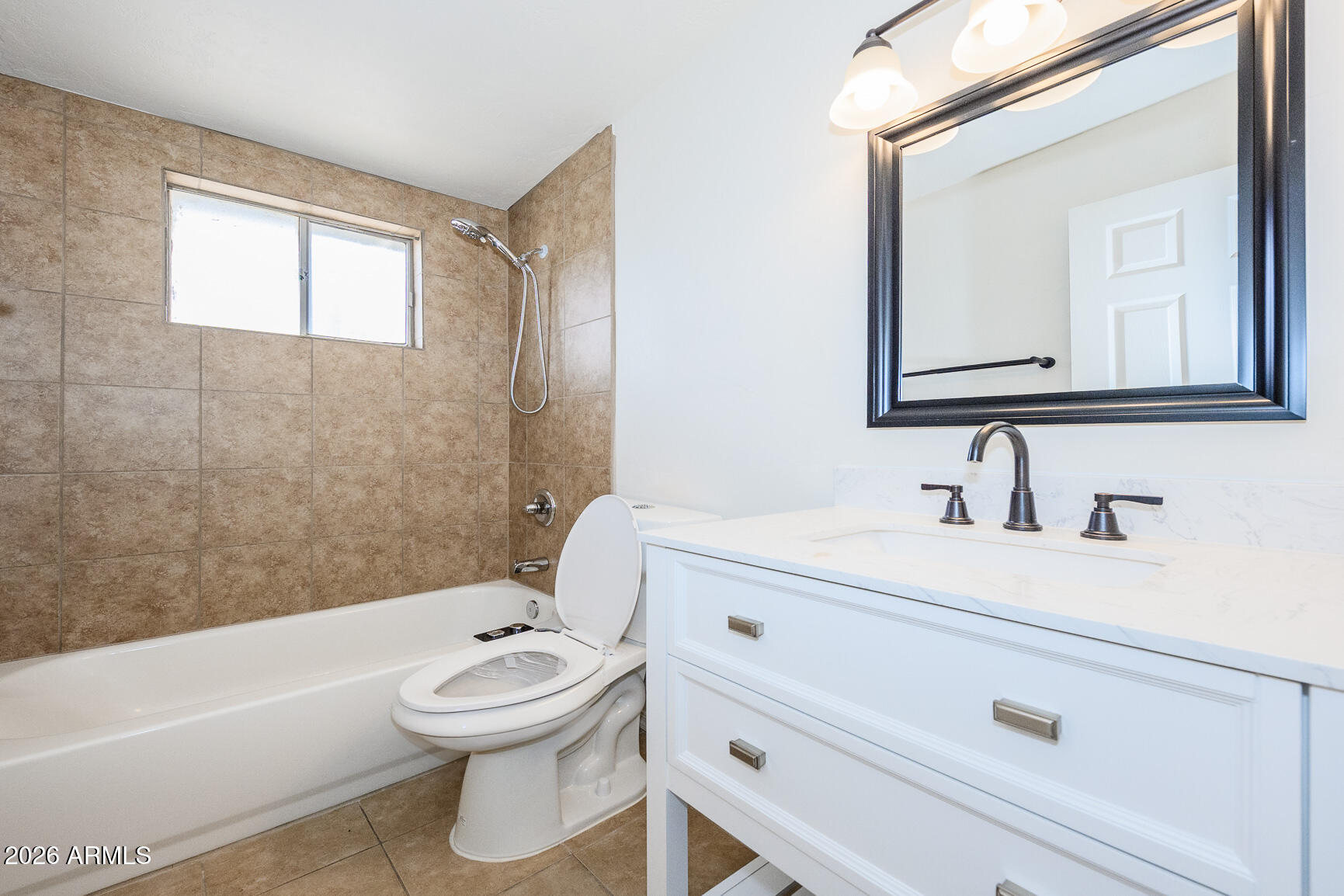 310 2nd Street Huachuca City, AZ 85616 - Photo 22 of 43 a bathroom with a sink a toilet and a bathtub