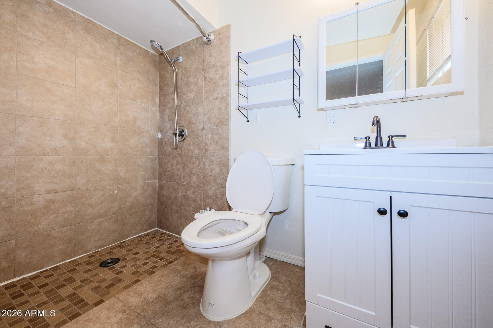 310 2nd Street Huachuca City, AZ 85616 - Photo 28 of 43 a bathroom with a sink and a toilet