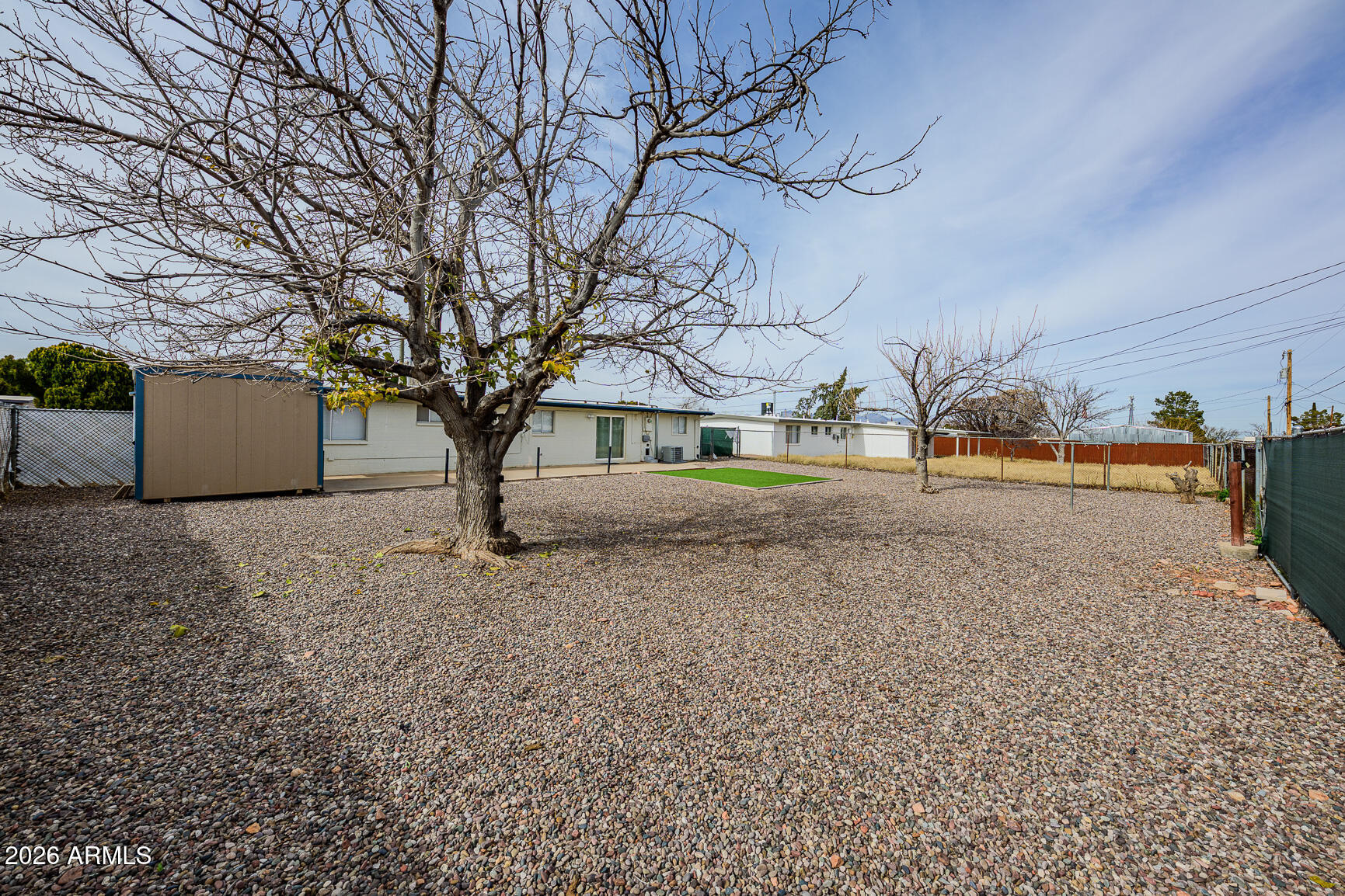 310 2nd Street Huachuca City, AZ 85616 - Photo 35 of 43 a view of a yard with trees