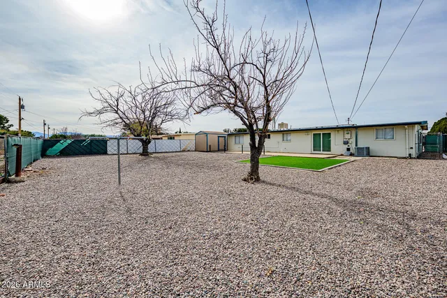 a view of a garden with a slide