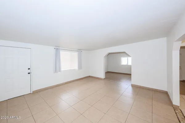 an empty room with a natural light