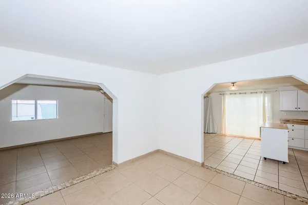 a view of kitchen with furniture and window