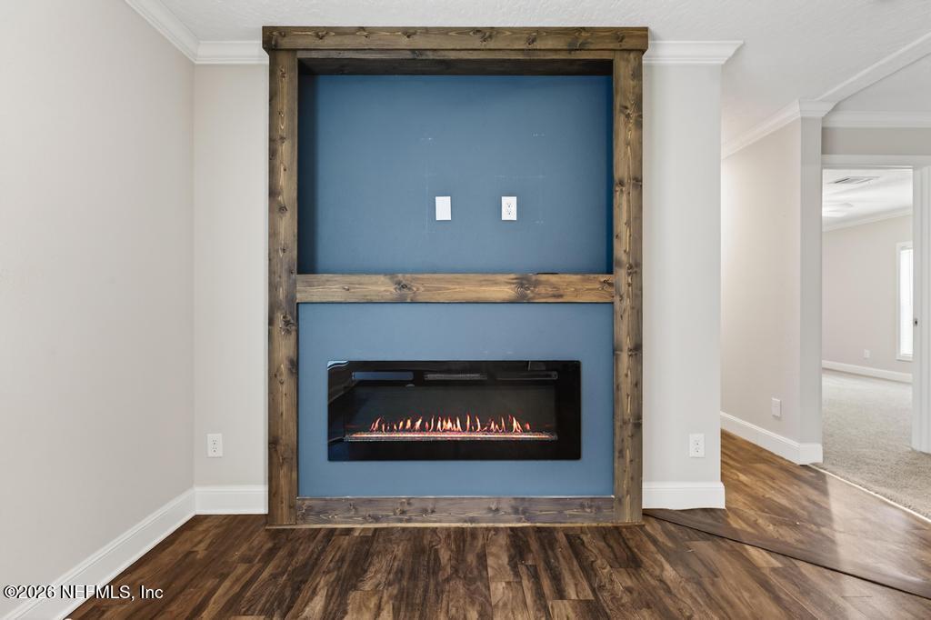 95605 Springhill Road Fernandina Beach, FL 32034 - Photo 26 of 62 a living room with a fireplace