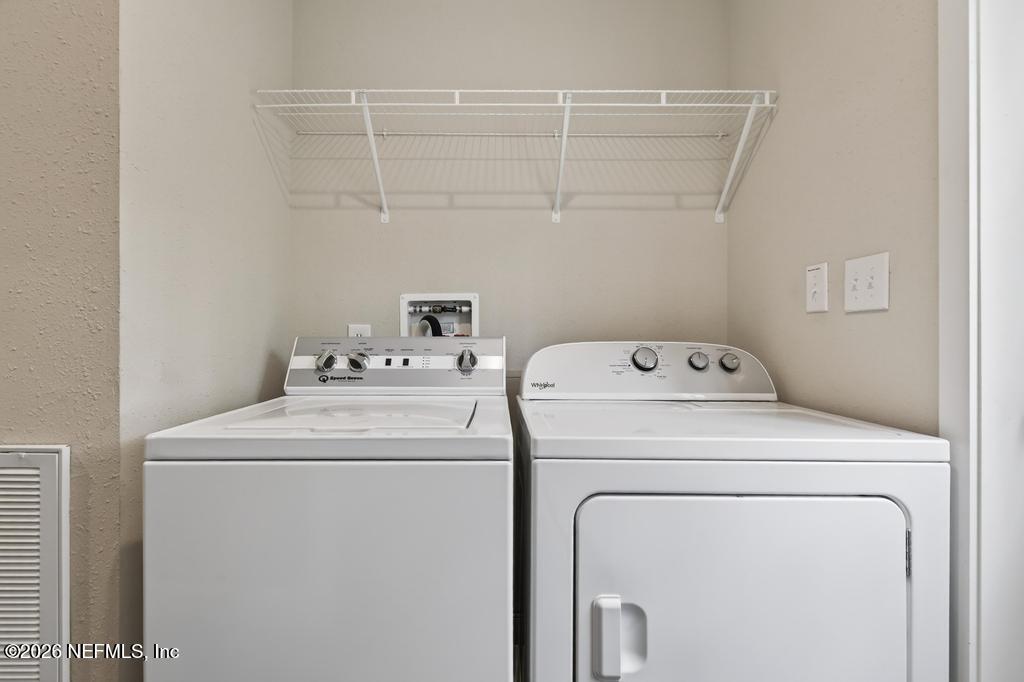 95605 Springhill Road Fernandina Beach, FL 32034 - Photo 48 of 62 a utility room with dryer and washer
