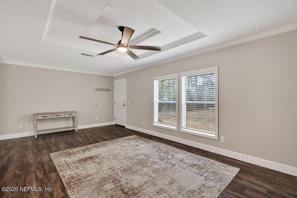 95605 Springhill Road Fernandina Beach, FL 32034 - Photo 10 of 62 a view of a livingroom with a piano and wooden floor