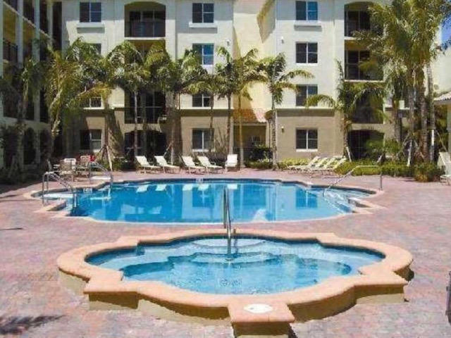2204 Renaissance Way, Unit 204 Boynton Beach, FL 33426 - Photo 21 of 23 Pool area