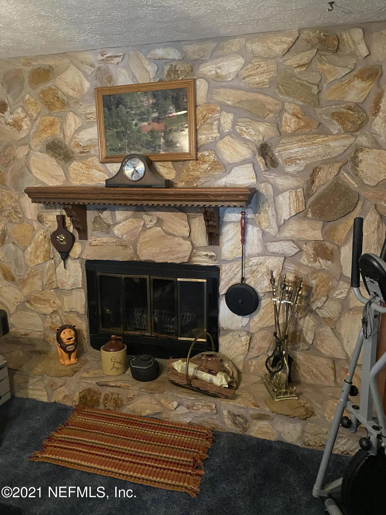 10981 Cisco Gardens Road North Jacksonville, FL 32219 - Photo 16 of 53 FIREPLACE AND GAME ROOM