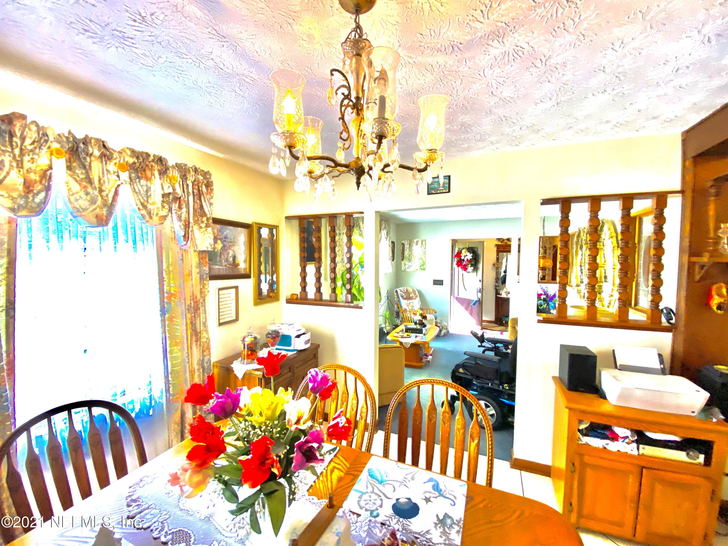 10981 Cisco Gardens Road North Jacksonville, FL 32219 - Photo 19 of 53 KITCHEN TO FAMILY ROOM