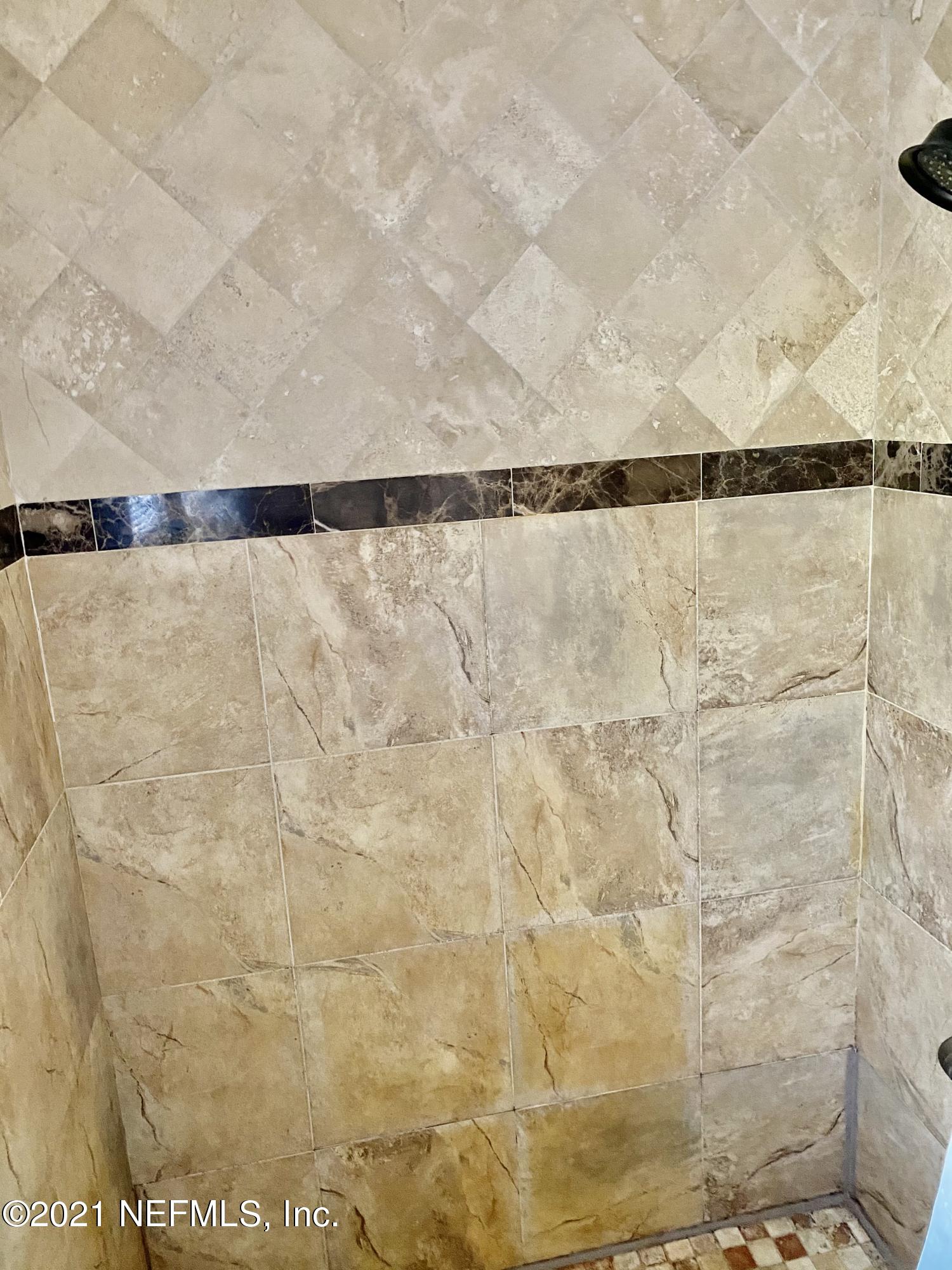 10981 Cisco Gardens Road North Jacksonville, FL 32219 - Photo 23 of 53 MASTER BATH TILE