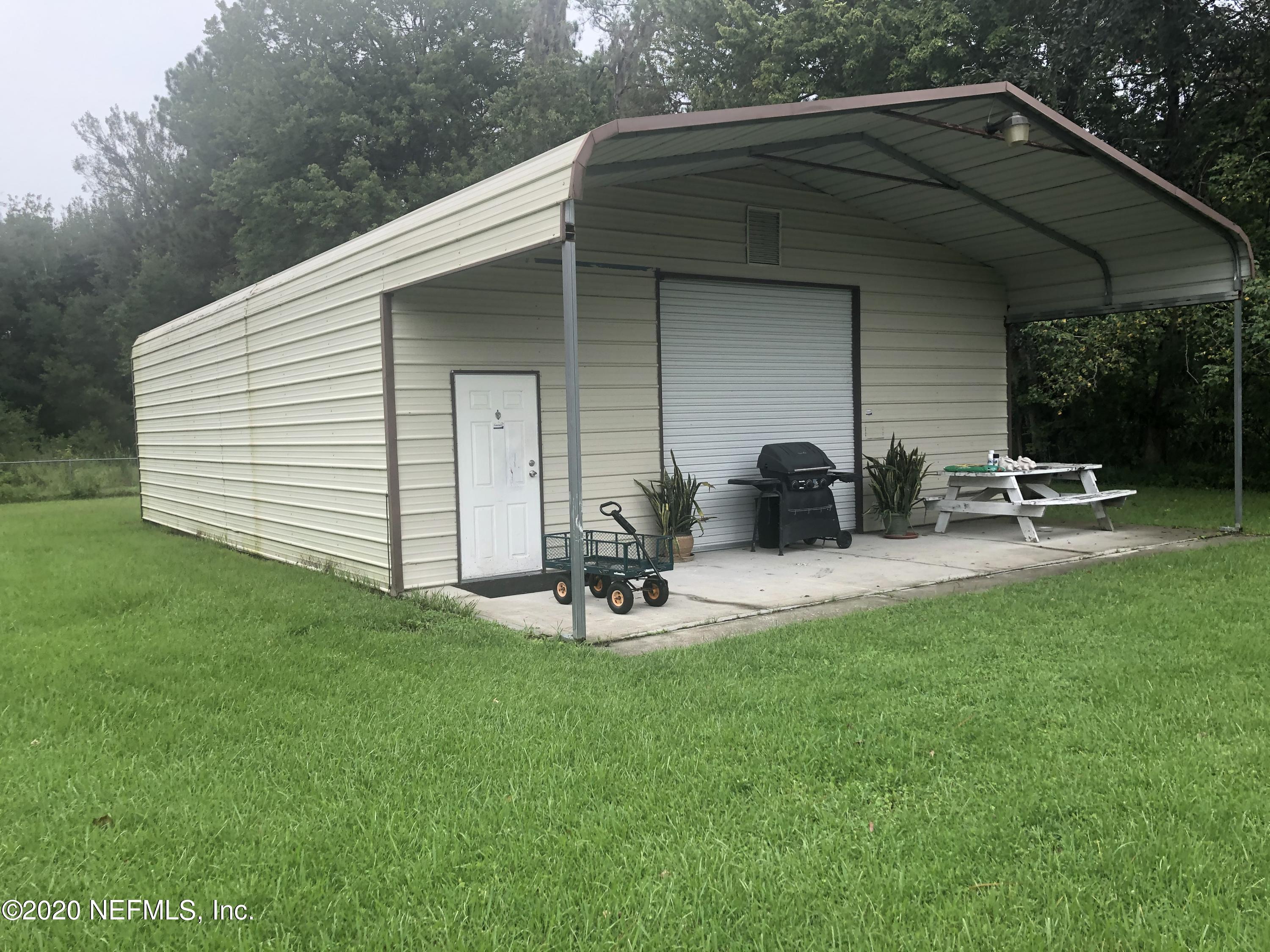 10981 Cisco Gardens Road North Jacksonville, FL 32219 - Photo 6 of 53 6 CAR GARAGE