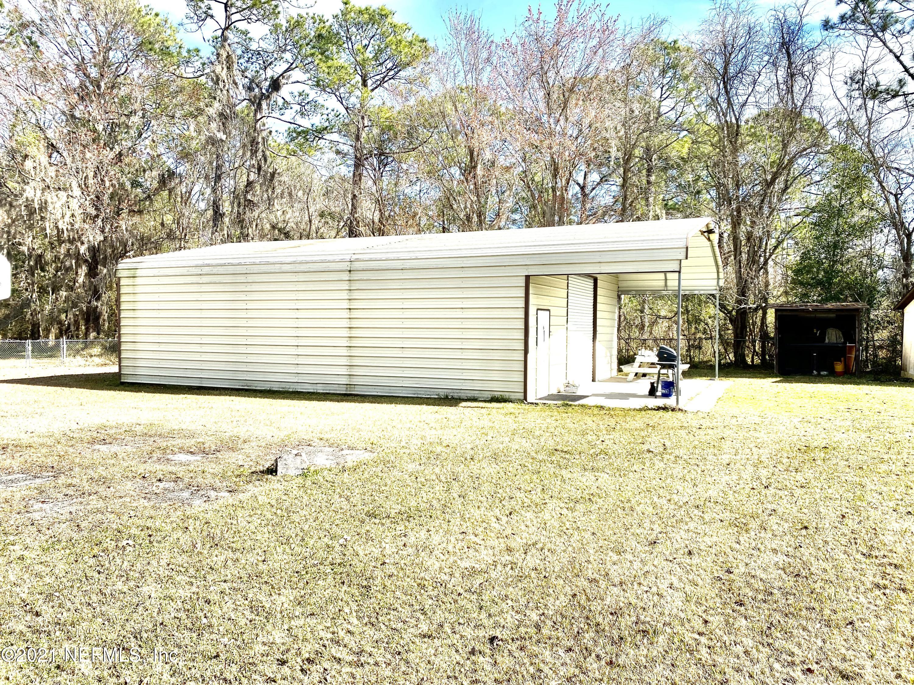 10981 Cisco Gardens Road North Jacksonville, FL 32219 - Photo 8 of 53 6 CAR GARAGE SIDE VIEW