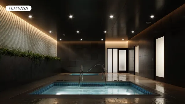 a living room with furniture a window and a fireplace