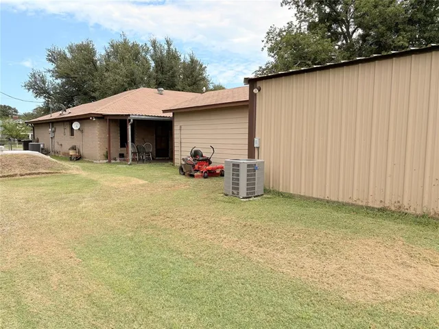 a view of a swimming pool with an outdoor space
