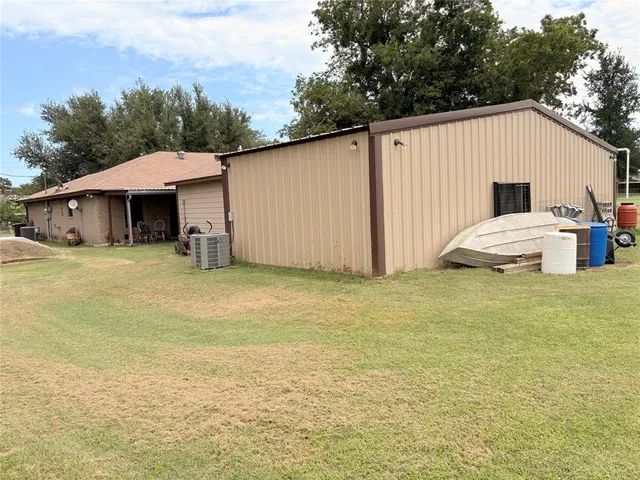 a view of front door and car parked