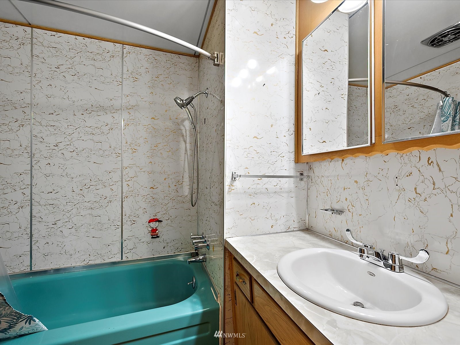 3333 228th Street Southeast, Unit 98 Bothell, WA 98021 - Photo 12 of 18 a bathroom with a sink and a bathtub