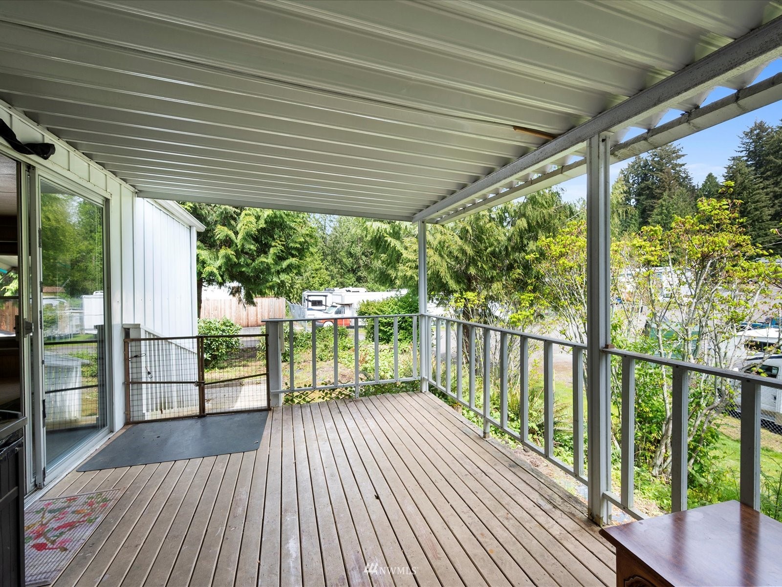 3333 228th Street Southeast, Unit 98 Bothell, WA 98021 - Photo 15 of 18 a view of a balcony with wooden floor